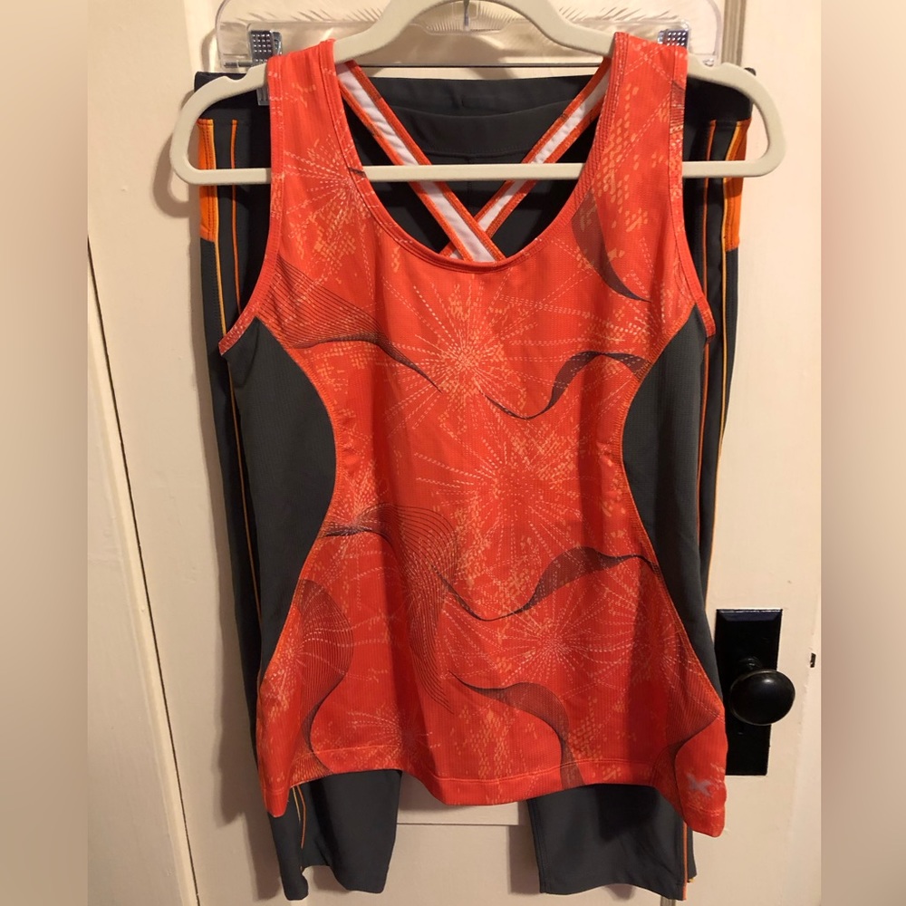 Xersion Performance Wear workout top and pants set SZ L in coral and dark grey.